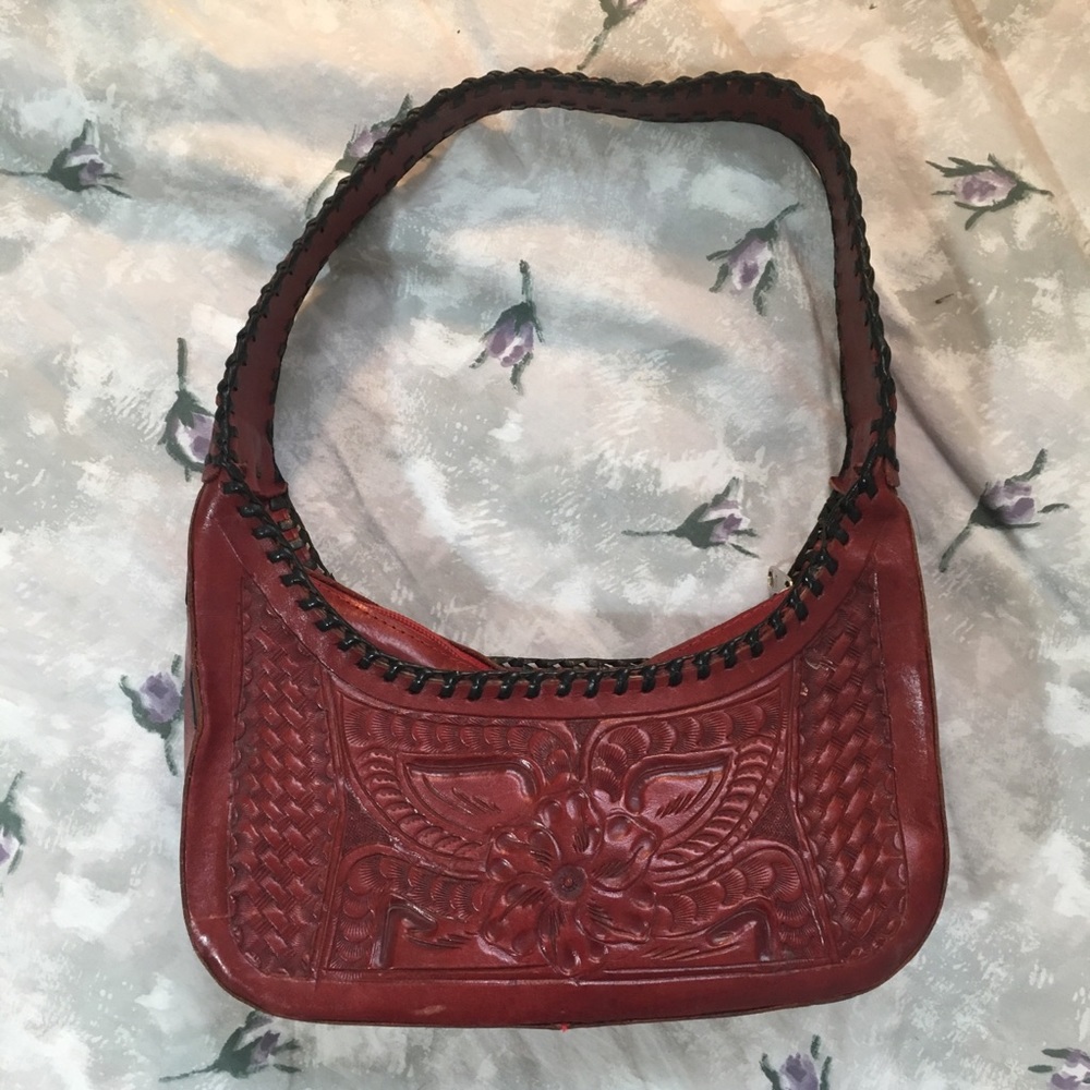 Leaders in leather red tooled purse
